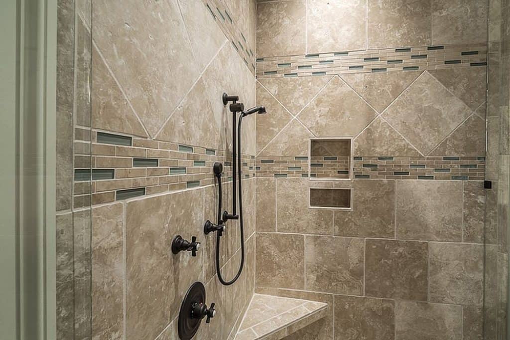 Tiles in the shower sealed with caulk.