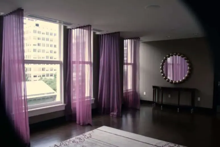 Living room with modern sheer curtains.