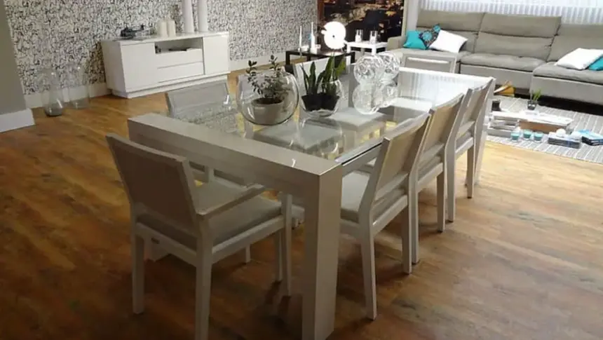 Dining table with dining chairs that fit under the table.
