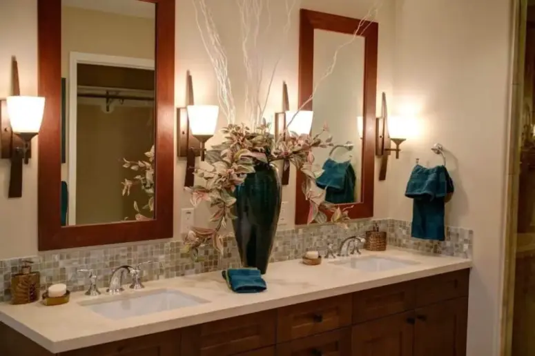 Bathroom with two mirrors.
