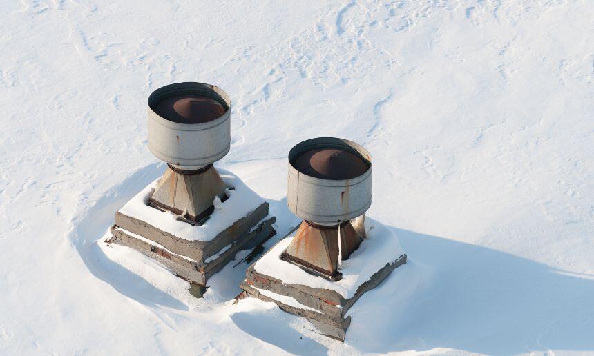 Roof vent pipes in the winter.